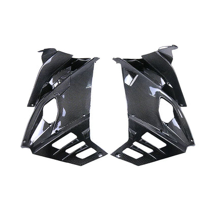 Carene laterali in carbonio per moto su sfondo bianco, tuning Da300Cavalli.