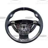 Volante BMW Serie 7 E65 E66 Fibra di Carbonio e Pelle