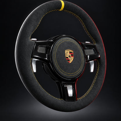 Volante Porsche in Alcantara con razze nero lucido e palette in alluminio