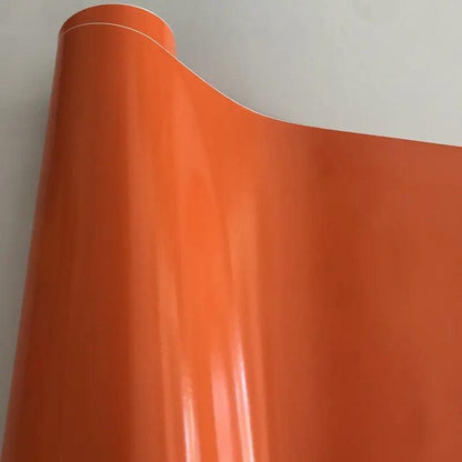 Pellicola wrap arancione lucida per auto tuning Da300Cavalli, dettaglio in primo piano