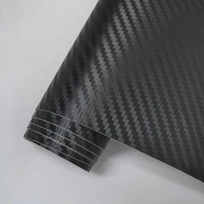 Pellicola wrap nero effetto carbonio per tuning auto, dettaglio texture Da300Cavalli